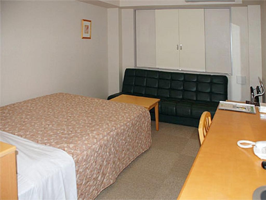 Best Inn Uozu Quarto foto
