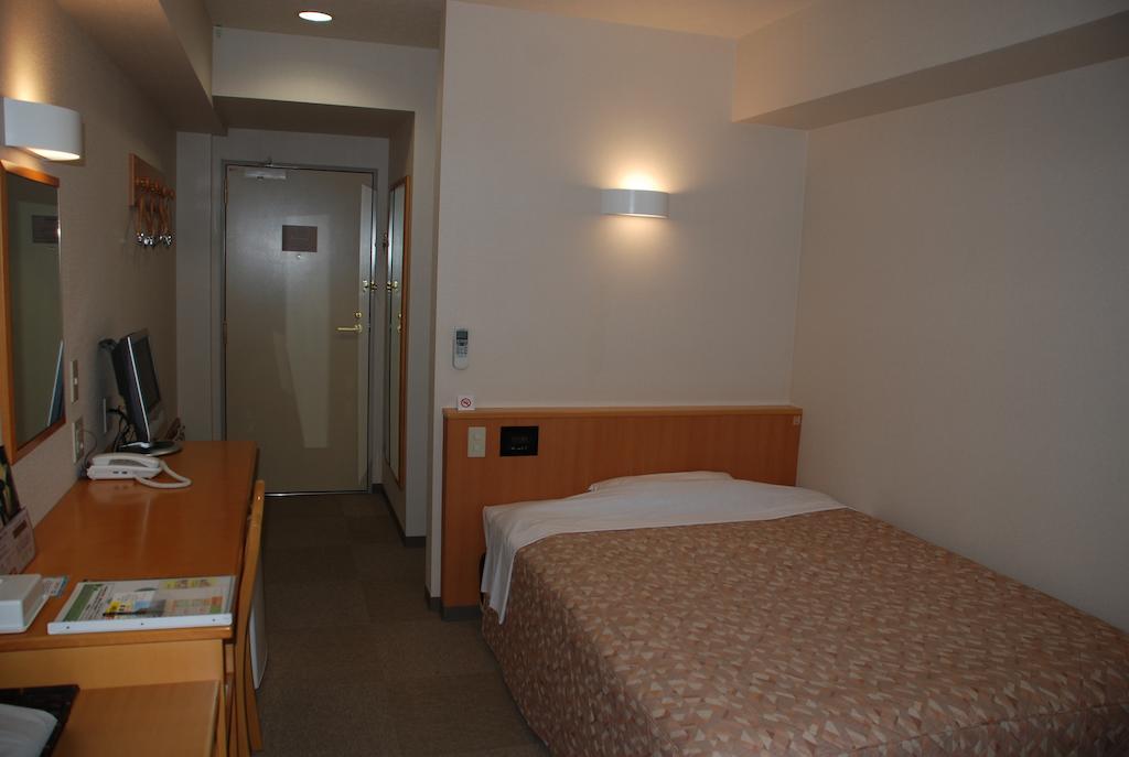 Best Inn Uozu Quarto foto